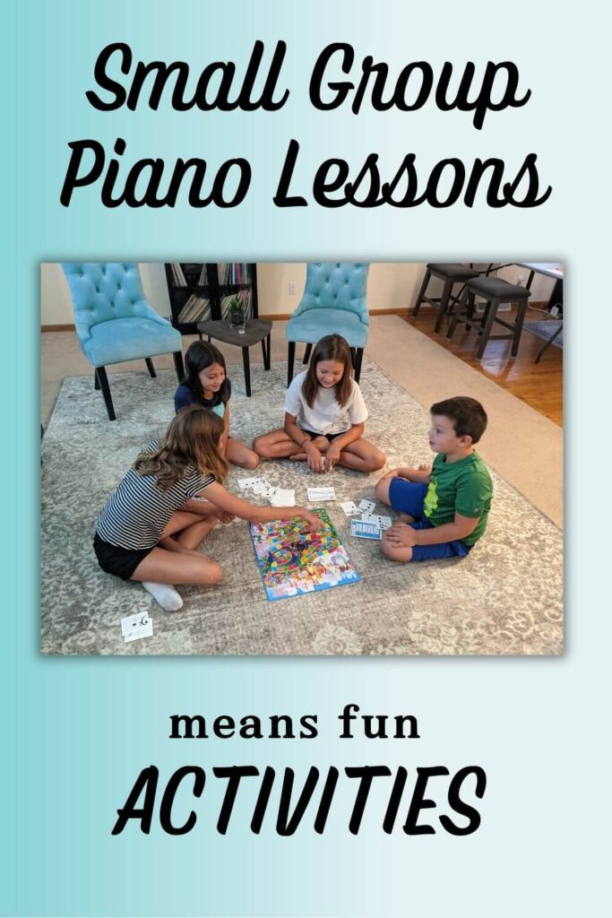 small group piano lessons means fun activities. four students play a music game on the floor.